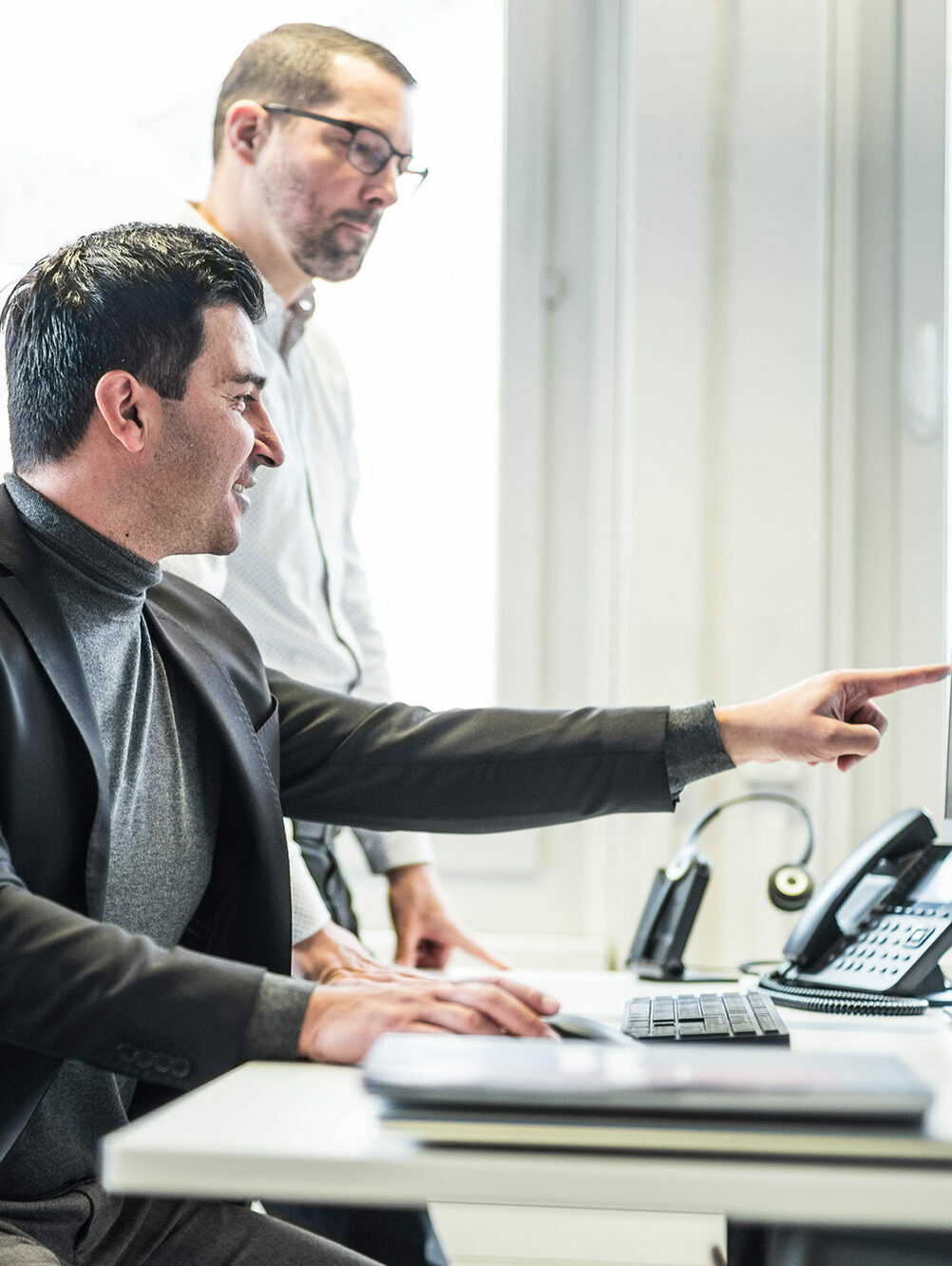 Employees at work in the SIBIRGroup